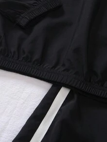 Genkimix Kids New Arrival Energetic Tween BoysLoose V-Neck Long Sleeve Letter Print T-Shirt With Relaxed Cuffed Pants Set. The T-Shirt Features A Distinctive Ribbed Black And White Collar Design With A Meaningful Letter Print, Paired With Comfortable, Soft And Loose Cuffed Pants. Fashionable, Versatile And Practical, Very Suitable For Boys To Wear In Daily Scenarios Like Going To School, Playing In The Community, Or Going Shopping.