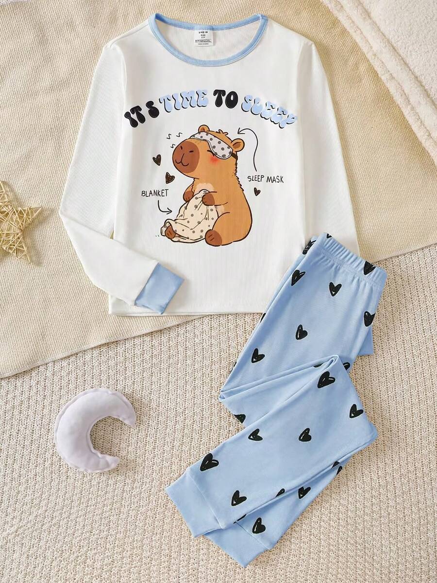 Bộ đồ ngủ ôm sát cho bé gái gồm quần dài và áo dài tay, họa tiết dễ thương trên chất liệu vải mềm mại, co giãn, thích hợp mặc hàng ngày - Màu xanh lam - Xem 1