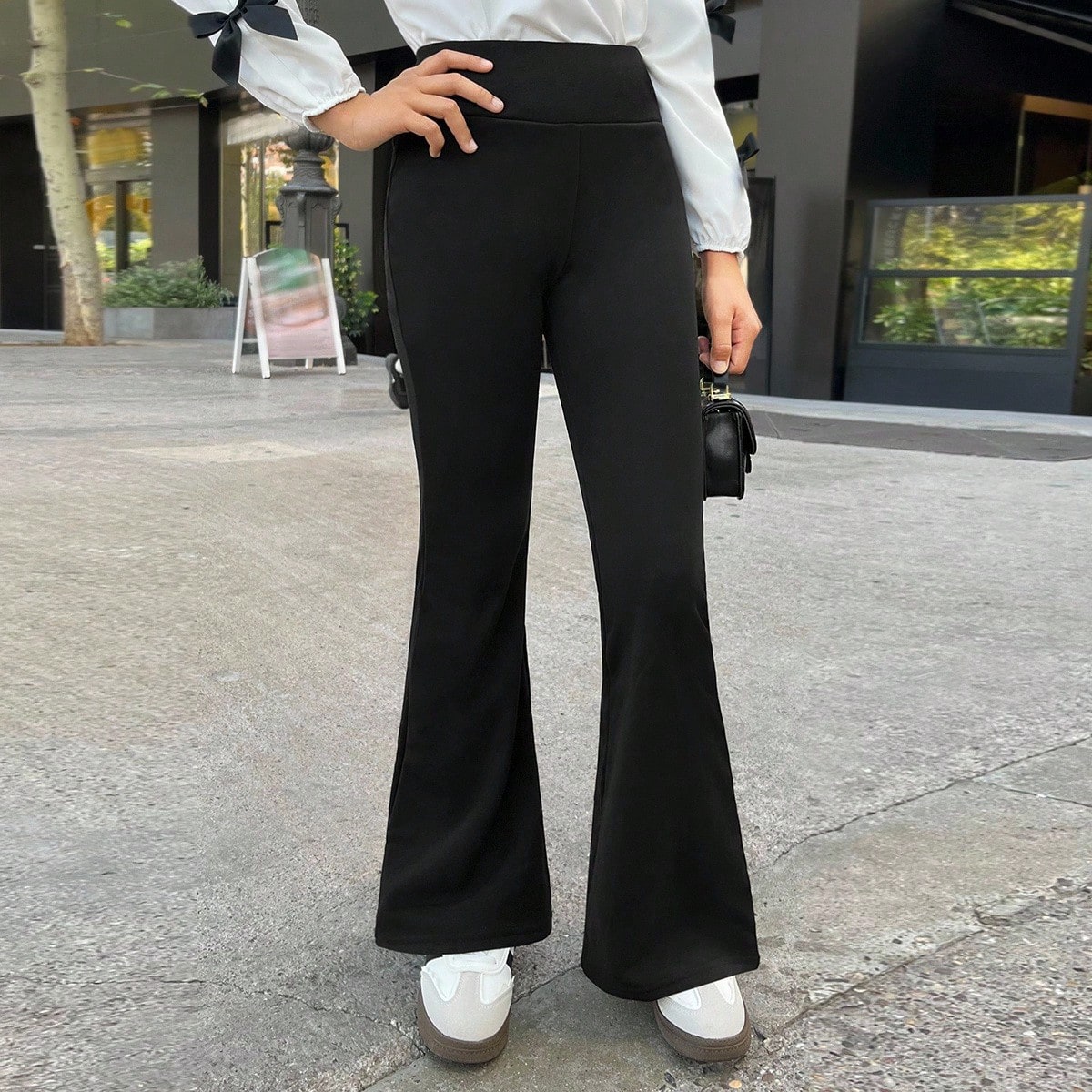 Pantalones acampanados de punto grueso negros para niñas preadolescentes, pantalones de moda casual y versátil para uso diario