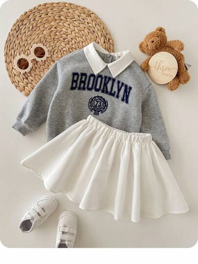 SHEIN 2 件女婴可爱百搭字母图案领子运动衫和迷你裙套装，秋冬