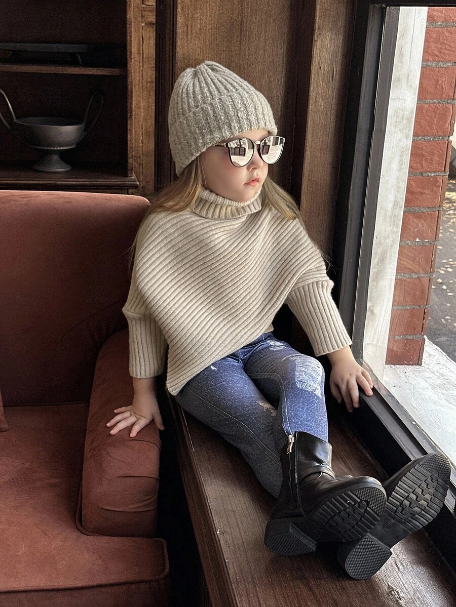 女童保暖杏色高领长袖针织毛衣，少女时尚休闲不对称下摆套头衫，舒适保暖，柔软亲肤