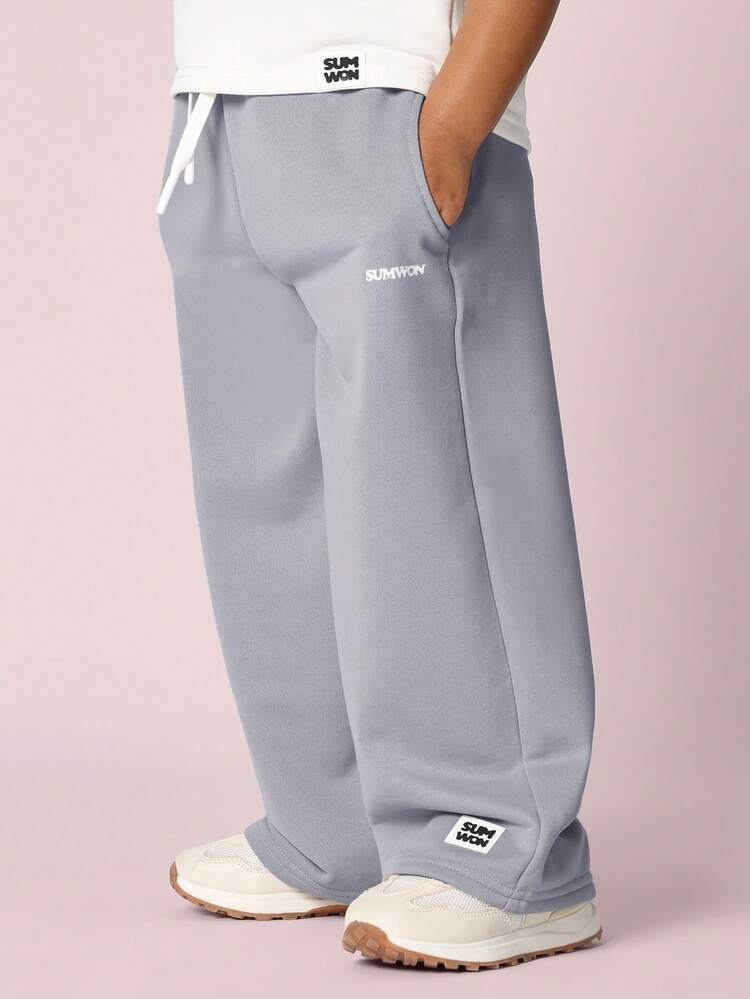 Spodnie dresowe z szerokimi nogawkami i luźnym krojem oraz ściągaczem w pasie