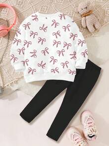 SHEIN Bộ 2 món Happikins gồm áo nỉ dài tay cổ tròn dày dặn, mềm mại, in hình mèo và báo hoạt hình dễ thương, có nơ, và quần legging, thích hợp cho mùa thu đông. Trang phục mèo cho bé gái, áo len trẻ em, quần áo dễ thương cho bé gái, quần áo mùa thu đông, quần áo Kawaii cho trẻ em. - Nhiều màu - Xem 2