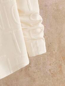 HIMLAND Men Casual Letter Embossed Design Crew Neck Long Sleeve Loose T-Shirt, Fall