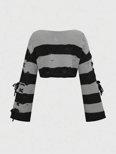 Top tricoté court à lacets sur le côté, rayures orange et noires pour Halloween