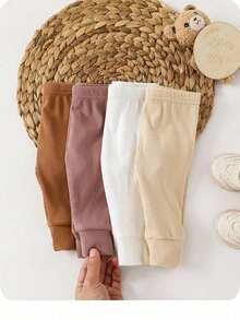 SHEIN 4 piezas Pantalones elásticos de cintura sólida de punto para bebé recién nacido niña, versátiles para otoño/invierno - Multicolor - Ver 1