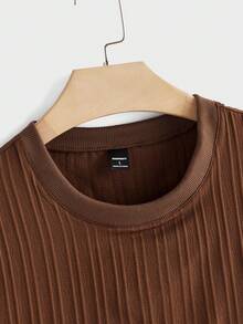 Manfinity Homme مجموعة تي شيرت تي شيرت كم قصير رقبة دائرية و شورت كاجوال أحادي اللون للرجال