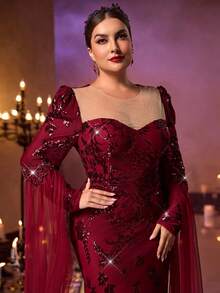 Aureia فستان أنيق رومانسي أحمر اللون بتصميم رقبة قلب شفاف من الشبك والتطريز الفاخر بالخرز وذيل سمكة الحورية، مناسب للزفاف والحفلات والمناسبات المسائية (مزخرف بشكل كبير)