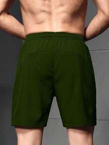 Manfinity Sport Corelite Quần short thể thao nam kiểu boyfriend, in chữ, có túi khóa kéo, dây rút ở eo, co giãn, thoáng khí, nhẹ, mát mẻ, phản quang, ôm sát, thích hợp cho tập luyện, chạy bộ, tập thể dục. - xanh quân đội - Xem 2