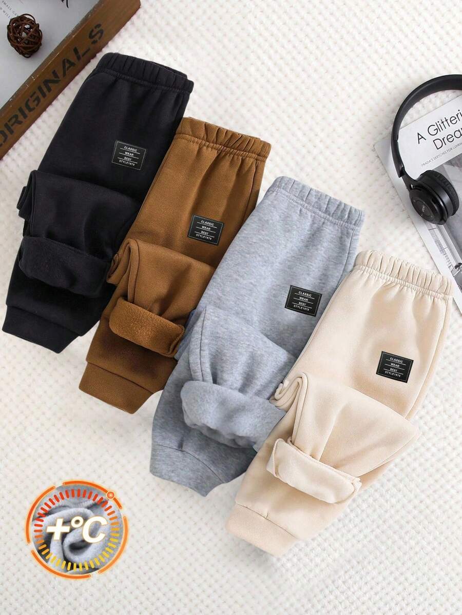 SHEIN Bộ 4 món quần áo trẻ em trai thoải mái, thời trang, đơn giản, tiện dụng, dễ phối đồ, có họa tiết trang trí, chất liệu mềm mại, dày dặn, thích hợp cho cả gia đình và dự tiệc sinh nhật. Phù hợp cho sinh hoạt hàng ngày, đi học, du lịch, thể thao, mùa thu đông. - Nhiều màu - Xem 1