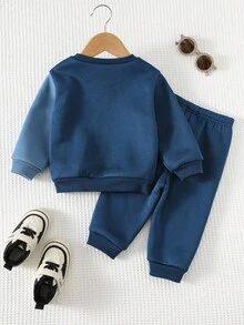 Cozy Pixies Set de 2 piezas de suéter de cuello redondo de manga larga y pantalones de cintura elástica en color contrastante para bebé niño