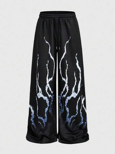 Street Life Pantalon de survêtement style sombre pour hommes ! Imprimé flamme + coupe large, créant une ambiance mode rebelle