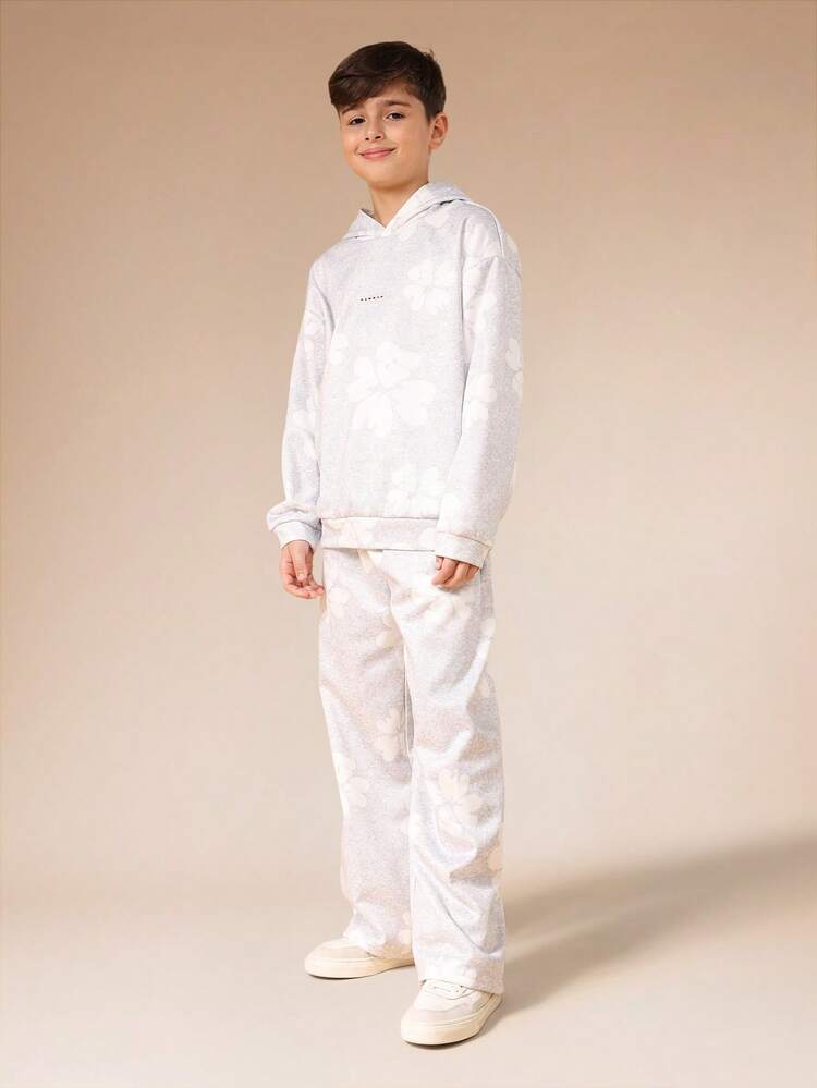 Conjunto de sudadera con capucha y pantalones deportivos de pierna ancha con estampado floral