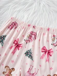 女孩的圣诞驯鹿、圣诞树、圣诞礼物、圣诞蝴蝶结、姜饼元素印花舒适短袖开领家居服套装，采用阻燃面料制成