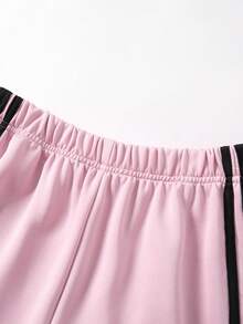 SHEIN ChillGRL Ensemble 4 pièces pour adolescentes, streetwear de base : t-shirt à manches longues col rond court avec pantalon de survêtement ample à rayures contrastées. Convient pour le quotidien, les déplacements, les sorties décontractées, les vacances, les rencontres, le style de rue - Noir - Voir 4