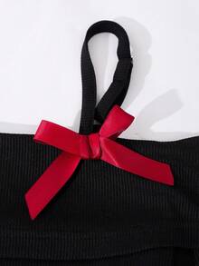 SHEIN 少女时尚优雅T恤套装，白色针织上衣搭配黑色梭织蛋糕裙，上衣饰有黑色蝴蝶结，裙子饰有珍珠。 - 黑色 - 查看 7