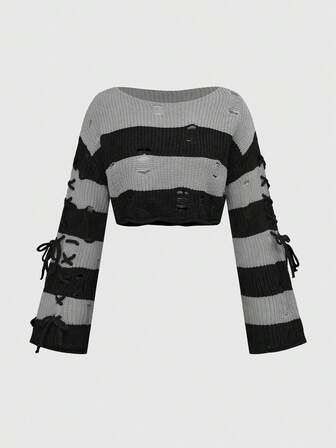 Top corto a maglia a righe arancioni e nere con lacci laterali per Ognissanti