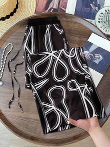 GlowEve CURVE Plus Size Women Floral Print Patchwork Solid Color Elastic Waist Drawstring Tie Waist Casual Pants - Multicolor - View 1