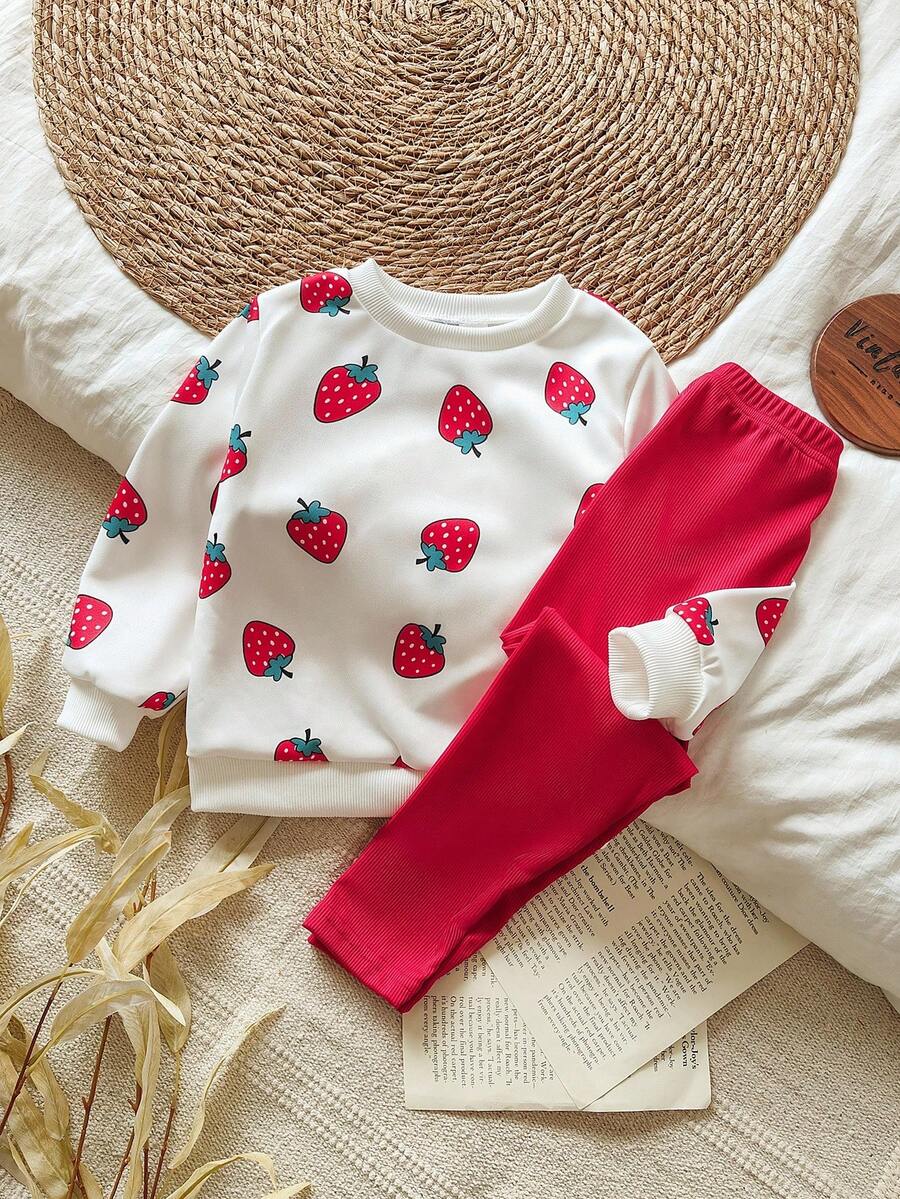 SHEIN Vintaside Kids بلوزة كم طويل مطبوعة بالفراولة الأومبير وسروال ضيق مجموعة ملابس مكونة من قطعتين، أنيقة وجميلة للفتيات، للربيع/الخريف - الأحمر - مشاهدة 1