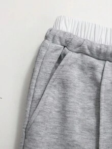 SHEIN Pantalones deportivos casuales holgados de punto con contraste de color para adolescentes