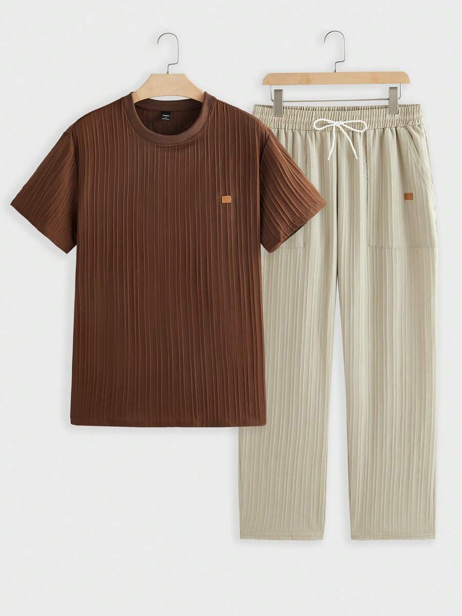 Manfinity Homme مجموعة تي شيرت تي شيرت كم قصير رقبة دائرية و شورت كاجوال أحادي اللون للرجال