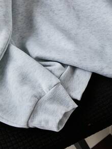 Sweat-shirt à capuche ample et décontracté pour adolescentes avec graphiques et broderie de fleurs en coquillage, manches longues