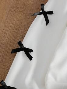 SHEIN 青少年女孩蝴蝶结印花圆领长袖运动衫和黑色迷你裙套装 - 黑與白 - 查看 5