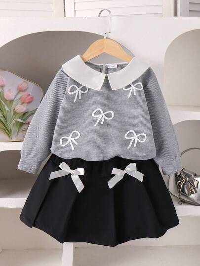 Genkimix Kids 2 件套女童休闲可爱针织运动衫套装，长袖蝴蝶结上衣和黑色百褶裙，适合秋季、假日和日常穿着