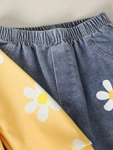 Elladie kids 这款女童可爱碎花卫衣套装适合春、秋、冬三季以及开学季穿着。针织卫衣饰有黄色碎花图案，罗纹袖口、领口和下摆均为黄色，长袖设计，搭配黄白碎花蓝色牛仔裤，两件套，可爱又优雅，适合日常穿着、上学、外出、聚会等场合。 - 彩色 - 查看 6