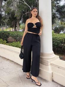 Nezia Cruz Áo crop top dệt kim họa tiết màu đen dành cho nữ có khóa kim loại hình trái tim rỗng phía trước, vừa vặn và tôn dáng, thích hợp cho tiệc tùng, hẹn hò, trà chiều, bãi biển, lễ hội âm nhạc, lễ hội hóa trang - màu đen - Xem 3