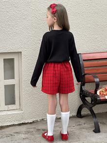 SHEIN Conjunto de 2 piezas de top negro y falda a cuadros rojos para niña preadolescente, adecuado para otoño/invierno - Rojo - Ver 2