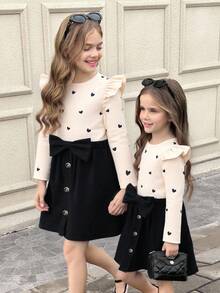 SHEIN Serisse Kids Conjunto de 2 piezas de suéter con cuello redondo y volantes con patrón de corazón tejido, y falda media con decoración de lazo de pana, estilo casual, lindo y elegante para niña preadolescente, adecuado para salidas diarias en otoño/invierno