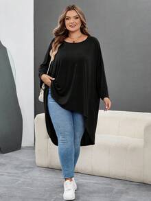 SHEIN CURVE+ Camiseta holgada de manga de murciélago con bajo asimétrico, cuello redondo, unicolor, elástica, suave, cómoda, versátil, de moda, ropa de uso diario para mujer, otoño/invierno, tallas grandes - Negro - Ver 6