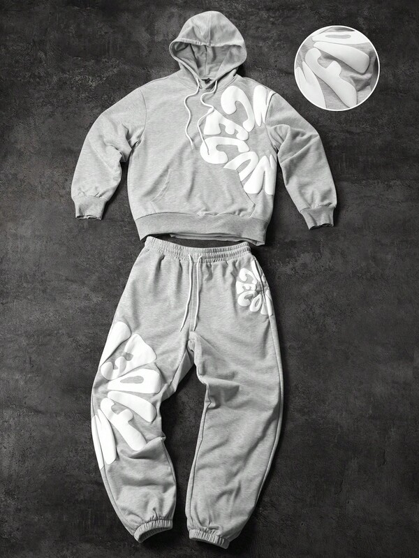 Manfinity EMRG Ensemble sweat-shirt à capuche et pantalon de jogging imprimé lettres grande taille pour hommes. Ensemble de survêtement 2 pièces, tenue streetwear pour hommes, ensemble jogging hommes, ensemble sweatshirt et pantalon, vêtements d'automne