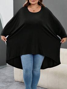 SHEIN CURVE+ Camiseta holgada de manga de murciélago con bajo asimétrico, cuello redondo, unicolor, elástica, suave, cómoda, versátil, de moda, ropa de uso diario para mujer, otoño/invierno, tallas grandes - Negro - Ver 4