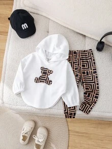 SHEIN Baby Mädchen süßes lässiges Set aus Langarm T-Shirt mit Cartoon Muster und karierter Hose