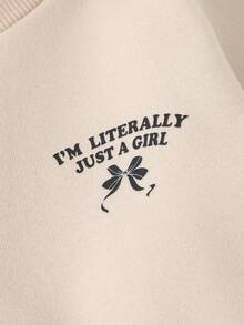 SHEIN Explorewe 2 Pieces Set Of Autumn/Winter Sweatshirts For Little Girls. The Set Includes A Casual And Simple Long-Sleeved Crew-Neck Top With Bowknot Ribbons And No Hood, And A Pair Of Bowknot Long Pants. It Is A Suit For Little Girls.