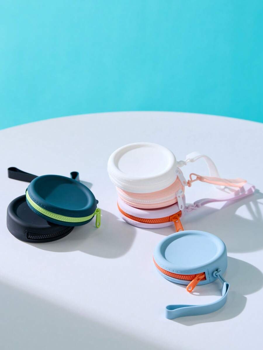 Joivida 1 Chiếc túi đựng đồ tròn độc đáo, vừa là ví đựng tiền xu vừa là móc khóa. Được làm từ silicon, mang phong cách tối giản hiện đại, cực kỳ nhẹ và dễ mang theo. - Nhiều màu - Xem 1