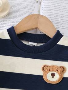 SHEIN Playful Pals 2pcs/Set Infant Unisex Baby Boy Spring/Autumn Colorblock Striped Crew Neck Long Sleeve Top With Cute Bear Graphic, Paired With Solid Blue Slim Fit Pants, Casual Outfit Suitable For Outings, Homewear, Light Sports, And Birthday Parties Baby Boy Clothes Long Sleeve Baby Casual Sets Infant Boy Clothes With Bear Parties Baby Boy Striped Outfit Black And White Baby Boy Outfit Baby Boy Outfit Baby Boy Outfit Set Baby Boy Clothes Boys Outfit Sets Fall Winter