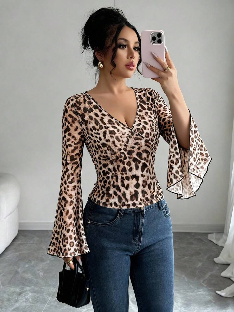 Modelyn Áo cánh tay dài cổ chữ V họa tiết da báo thanh lịch và thời trang dành cho nữ