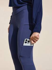 Easithlete Quần legging thể thao ngoài trời cao cấp mới dành cho nữ, quần legging bó cạp cao, màu đen, dài đến đầu gối, co giãn bốn chiều, lót nhiệt chải kỹ, nhanh khô và chống mùi, chống nước có túi, dùng cho đi bộ đường dài/thể dục/yoga/chạy bộ/leo núi - Màu xanh lam - Xem 2