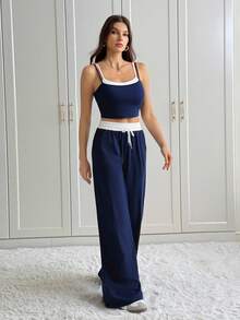 SHEIN Tall Modisches Kontrastfarben-Splicing Zweiteiler, bestehend aus Trägerhemd + Hose in Kontrastfarbe, geeignet für große Frauen im Sommer & Herbst