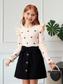 SHEIN Serisse Kids Conjunto de 2 piezas de suéter con cuello redondo y volantes con patrón de corazón tejido, y falda media con decoración de lazo de pana, estilo casual, lindo y elegante para niña preadolescente, adecuado para salidas diarias en otoño/invierno
