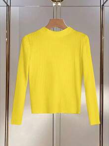 GlowEve تي شيرت نسائي أنيق بياقة على شكل حرف V وأكمام طويلة وأنماط مضلعة