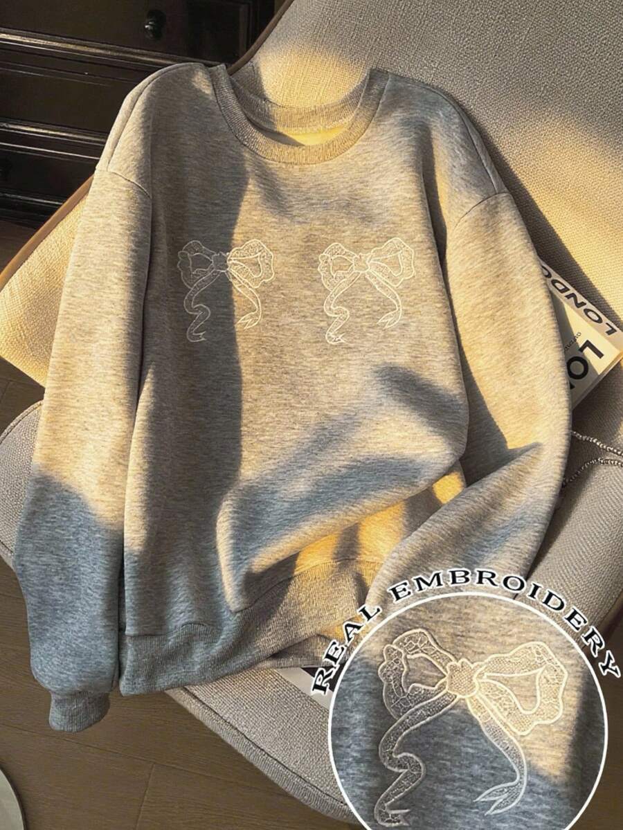 SHEIN Sudadera de cuello redondo con mangas raglán, bordado de lazo de encaje para mujer