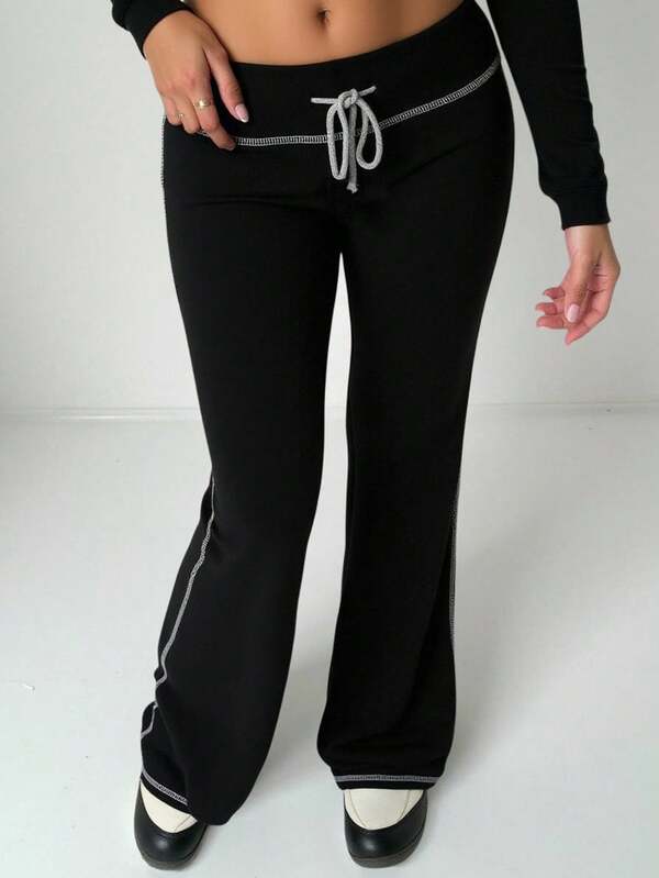 SHEIN Tonårsflickor Y2k låg midja färgblock dragsko casual mjukisbyxor, minimalistiska och moderiktiga för vardagsbruk, skolstartssäsongen, lämpliga för alla årstider, svarta mjukisbyxor, svarta byxor, svarta utsvängda byxor