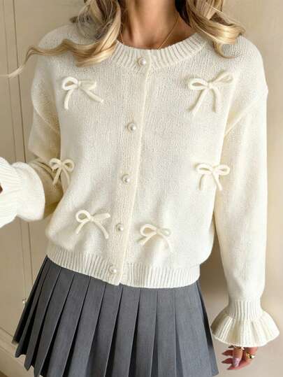 SHEIN Teen Girls' Casual Commuter Solid Color Cardigan With Bow & Faux Pearl Decor, Autumn/Winter Girl Sweater Jacket Kids Sweaters For Girls Button Girls Cardigan Girls Knitted Cardigan Girls Bow Cardigan Bow Clothes Bow Knit Set Teen Clothes Sweater Girl Knit Set Bow Sweater Tween Girl Clothes Bow Knit Sweater Teen Girls Sweater