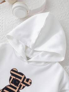 SHEIN Baby Mädchen süßes lässiges Set aus Langarm T-Shirt mit Cartoon Muster und karierter Hose