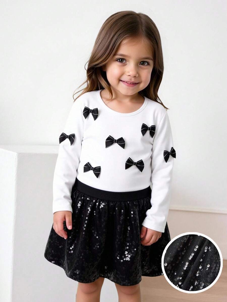 Maija Kids Maija Kids Bộ 2 áo thun dài tay cổ tròn đính nơ cho bé gái và chân váy xòe vải sequin - Màu be - Xem 1
