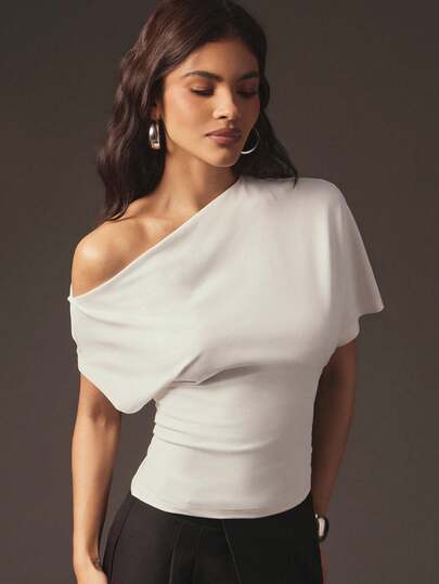 Hauture Damtopp med asymmetrisk axel och enfärgad design, modern och elegant